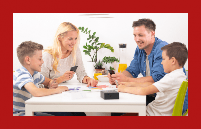 family playing a card game