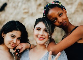 three women standing together