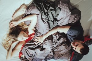 couple in bed sleeping