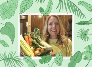 green leaves on green background with woman holding vegetables