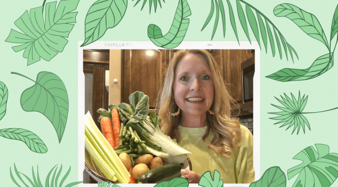 green leaves on green background with woman holding vegetables