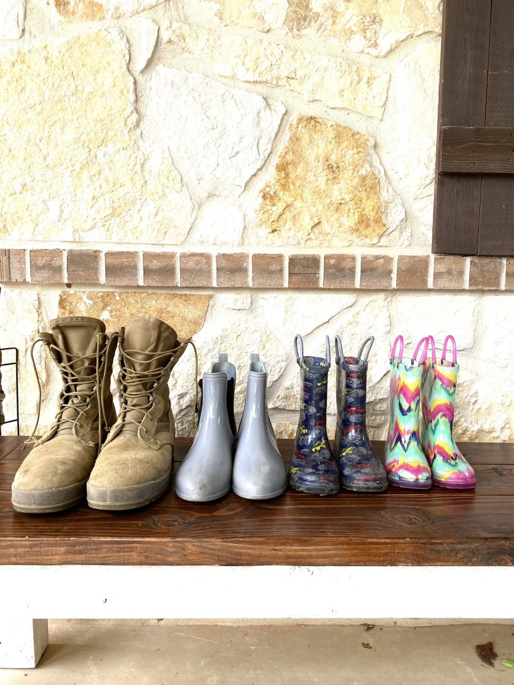 Military boots lined up alongside family boots