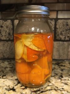 homemade cleaner with orange peels