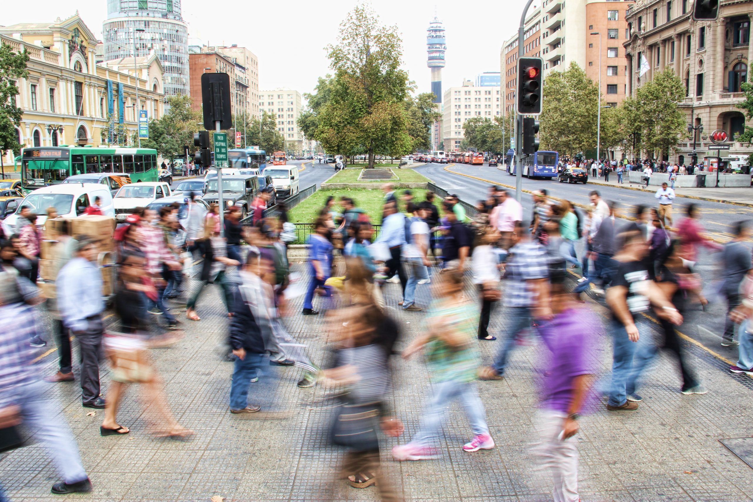 blurred image of people in busy road