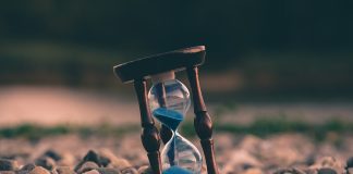 hourglass in pebbles to show time