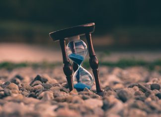 hourglass in pebbles to show time