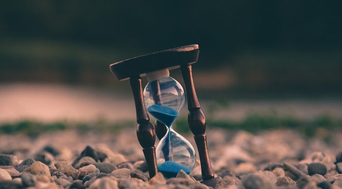 hourglass in pebbles to show time