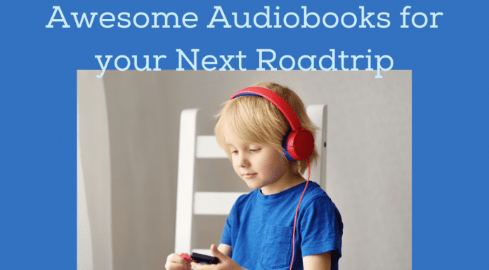 boy listening with headphones on blue background with "Awesome Audiobooks for your Next Roadtrip" in text