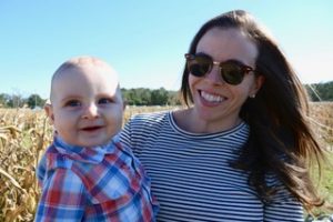 meg reichert and her son in a cornfield