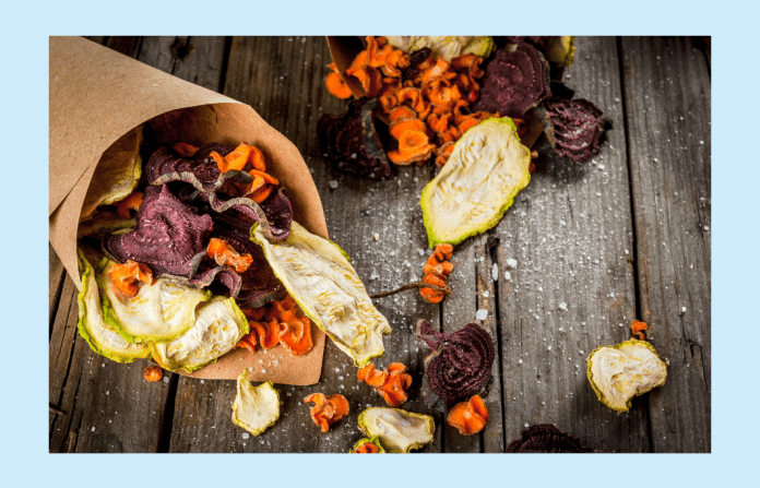 non-potato or veggie chips on a wood table