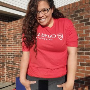 Diana Loader standing on a deck in sunshine