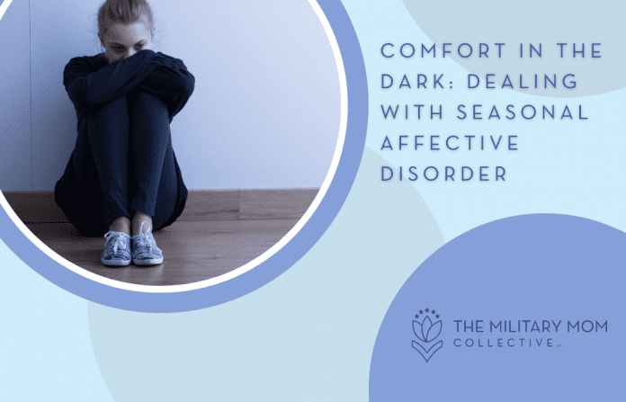 woman sitting in sadness with blue circles and "Comfort in the Dark: Dealing with Seasonal Affective Disorder" in text and MMC logo