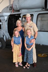 Schilling family picture of mom, dad, and two daughters