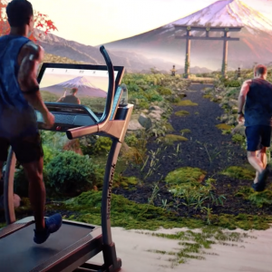 man running on treadmill with guided coaching to feel like he is actually running in another place in the world