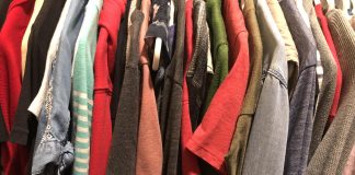 The Shirts We Wear closet view of shirts on hangers