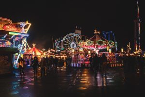 Hyde Park Winter Wonderland at night with rides lit up