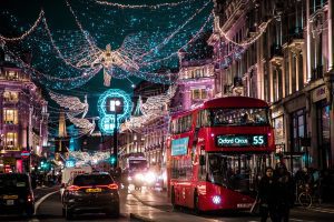 Oxford Circus Christmas lights in London with a traditional red double-decker bus