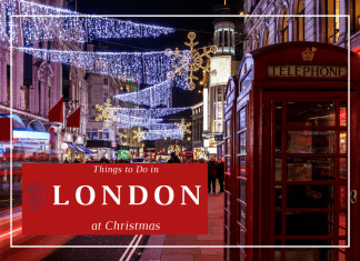 London street at Christmas with lights strung up and festive decorations