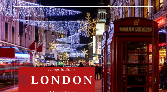 London street at Christmas with lights strung up and festive decorations