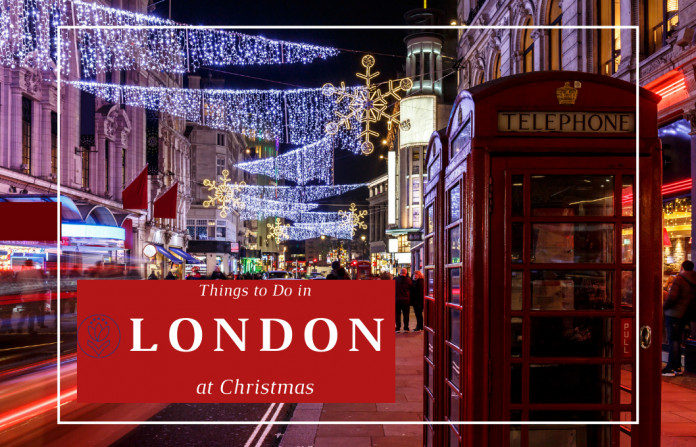 London street at Christmas with lights strung up and festive decorations