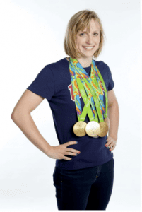 Katie Ledecky wearing many gold Olympic medals