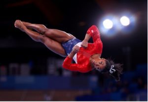 Simone Biles twisting in the air
