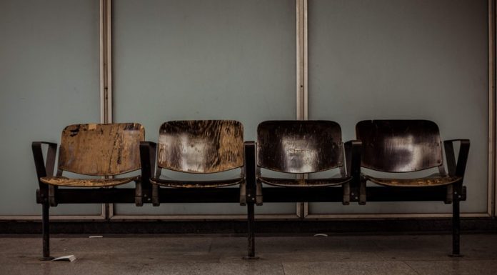 beaten up, leather chairs in a waiting room