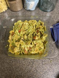 chicken pesto pasta meal in a baking dish