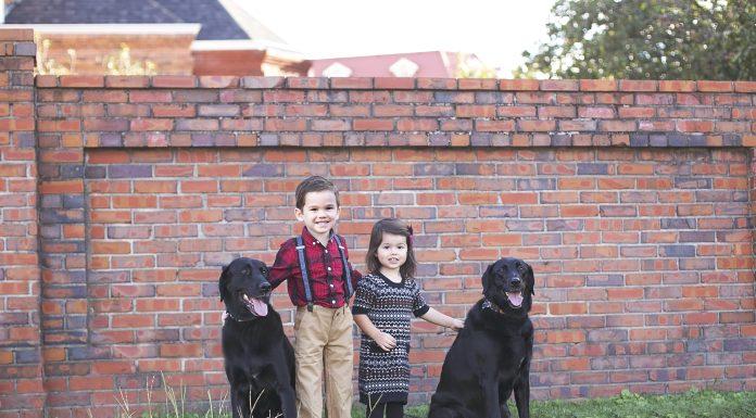 Children with black labs