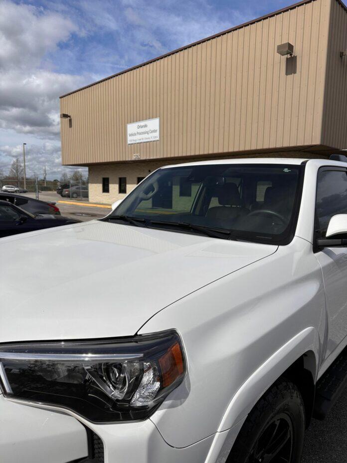 Car located in front of Vehicle Processing Center in Orlando Florida