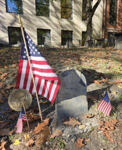 Gravestone of Paul Revere with Boston Tea Party Participant plaque and three American flags