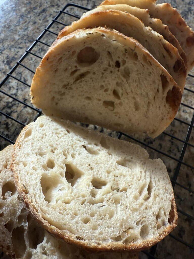 Sliced sourdough bread loaf with the inside open