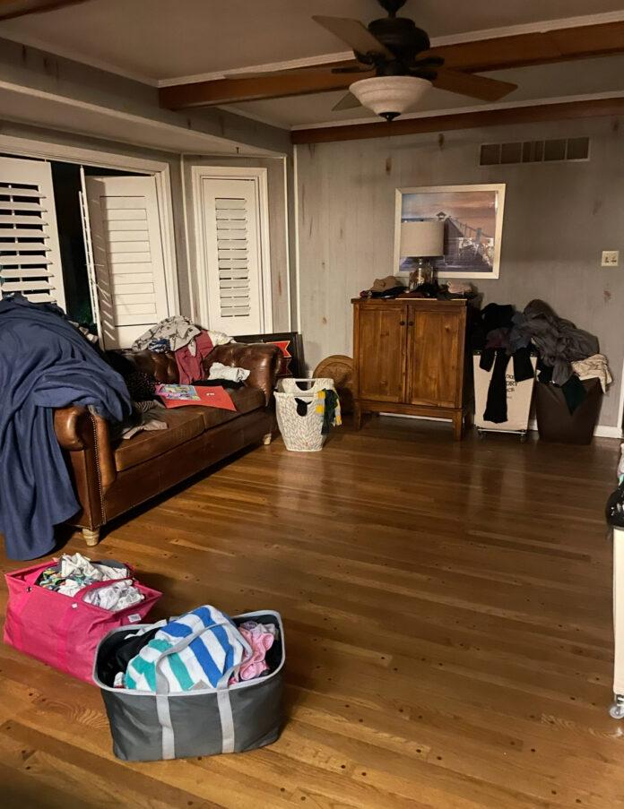 messy house Picture of a messy living room, laundry everywhere, that obviously belongs to a burnt-out mom