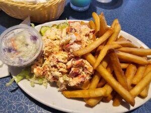 Lobster Roll and French Fries at restaurant in Cape Cod