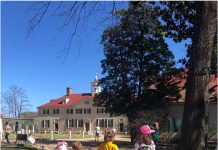 Remembering Presidents’ Day With Meaning Mount Vernon entrance with children in foreground - Remembering President's Day