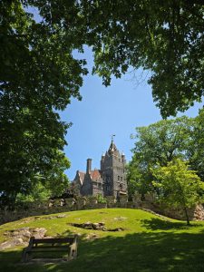 Boldt Castle, located in the St. Lawrence river north of Fort Drum, seen through trees