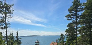 Lighthouse with ocean in background