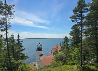 Lighthouse with ocean in background