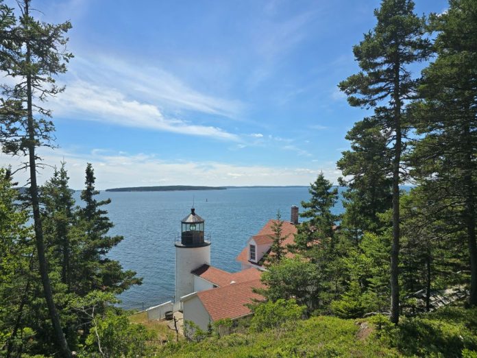 Lighthouse with ocean in background